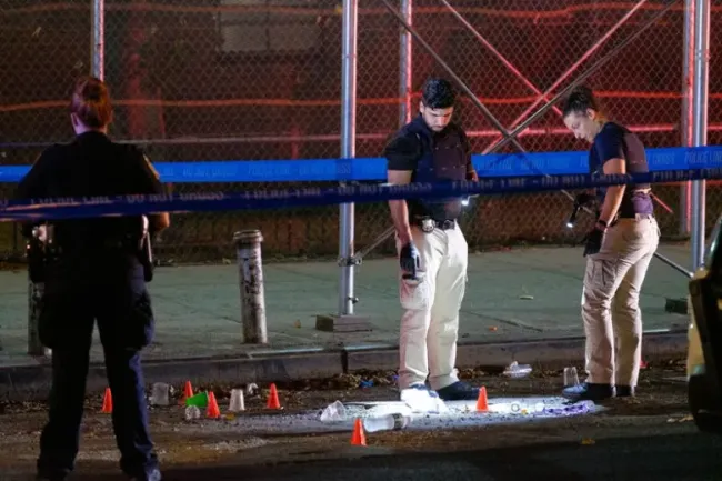 a gunshot outside 449 W. 125th St. in Harlem.