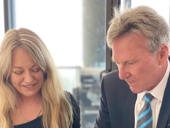 Amanda Brown and Sam Newman