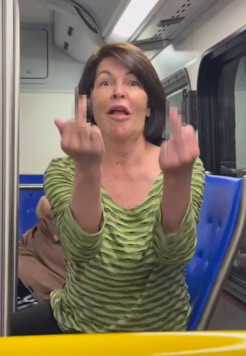 A woman caught hurtling racist 